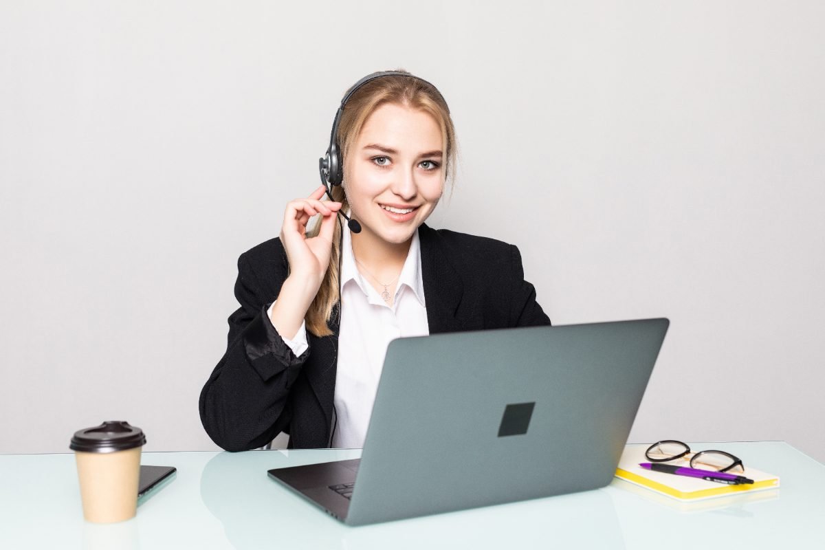 Smiling customer service representative wearing a headset