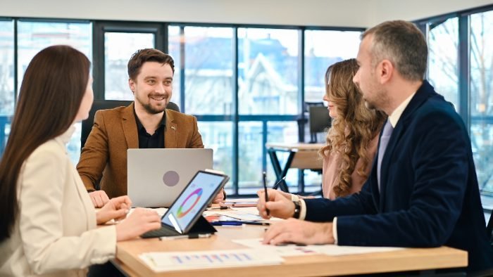 Professional services team meeting with a client